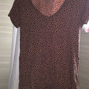 A cheetah print v-necked t shirt